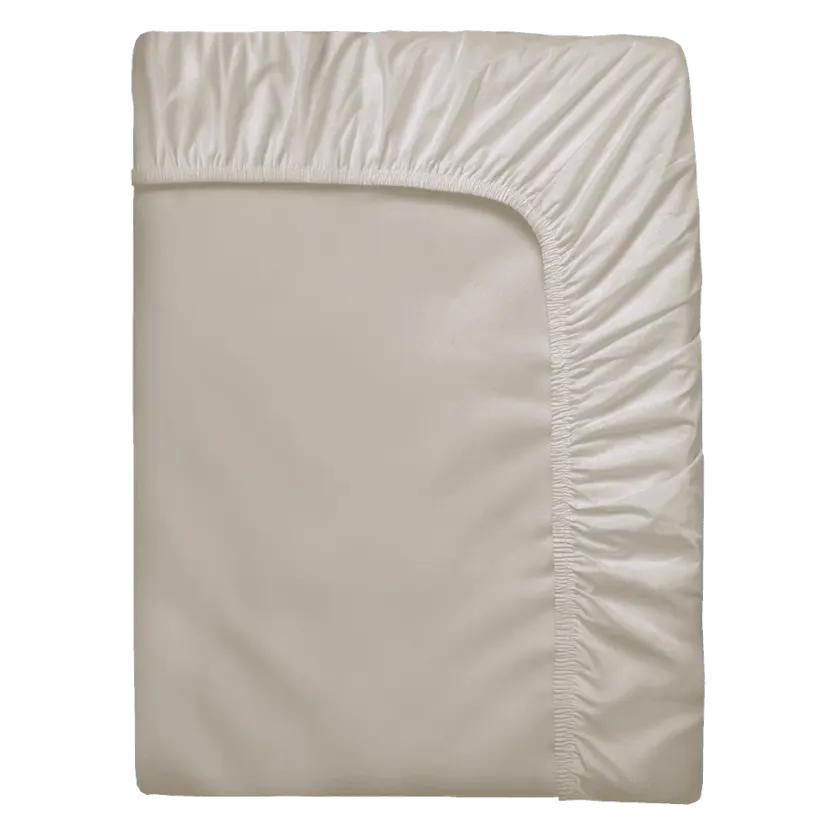Sammenbrettet beige formsydd laken med elastisk kant hele veien rundt